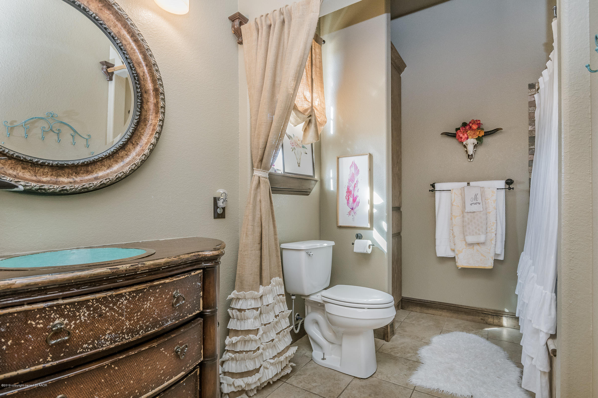 9701 Ashton Road Amarillo, TX 79119 - Photo 17 of 27 Hall Bathroom