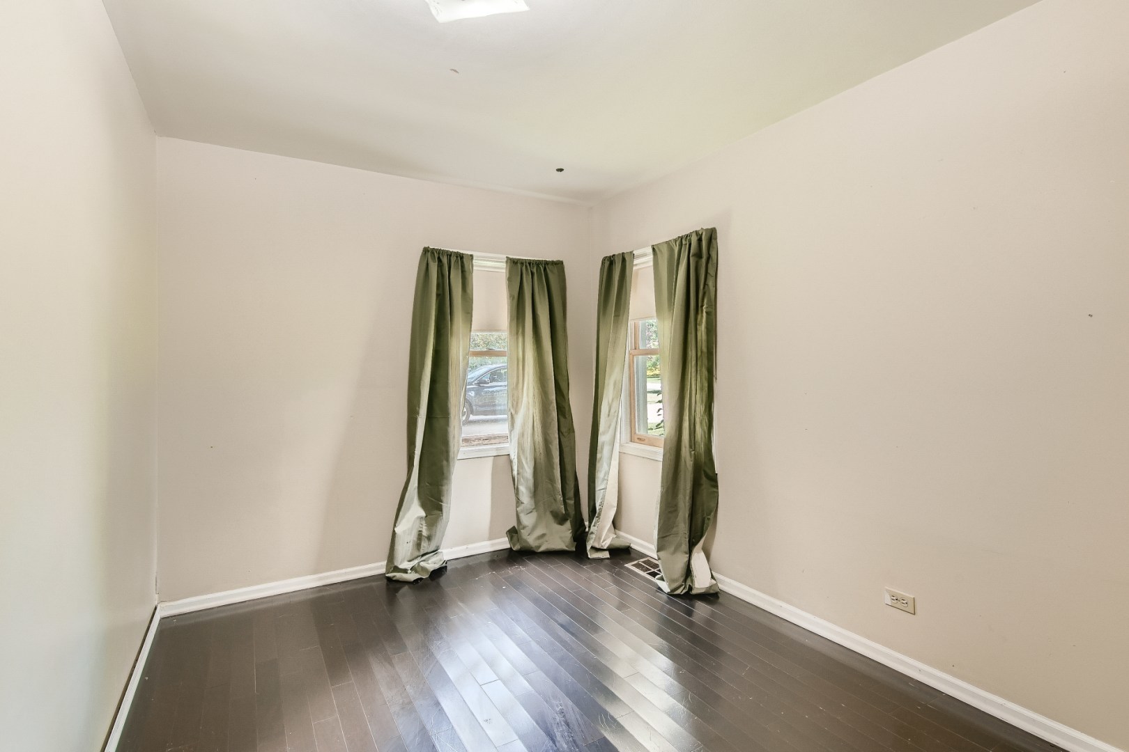 1750 Elliott Street Park Ridge, IL 60068 - Photo 15 of 22 an empty room with wooden floor and windows