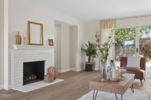 a kitchen with a sink appliances and cabinets