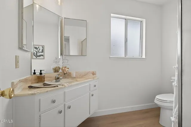 a bedroom with a bed and furniture