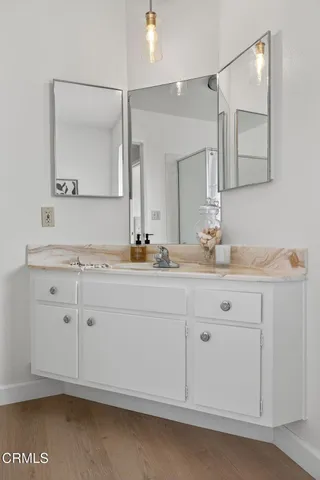 a workspace with furniture and a window