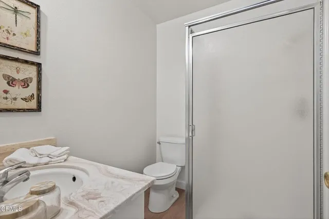 a view of a swimming pool with chairs