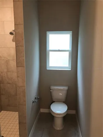 a bathroom with a toilet