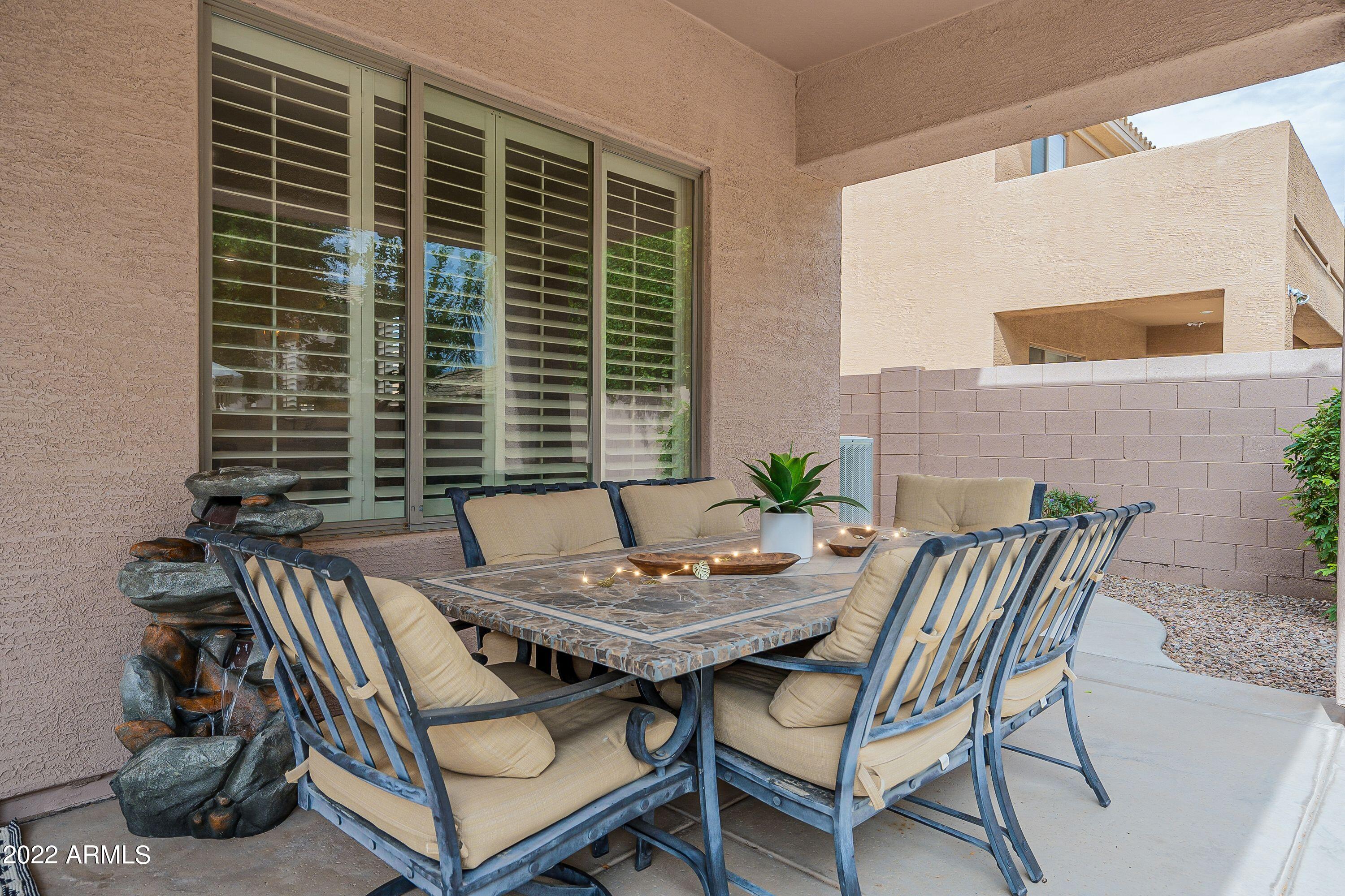 4770 East Buckboard Road Gilbert, AZ 85297 - Photo 75 of 97 a view of a outdoor seating area with furniture