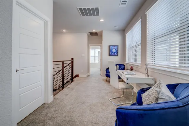 a bedroom with bed and window