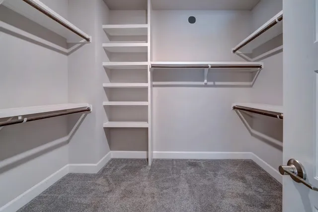 a bathroom with a sink a mirror and a shower