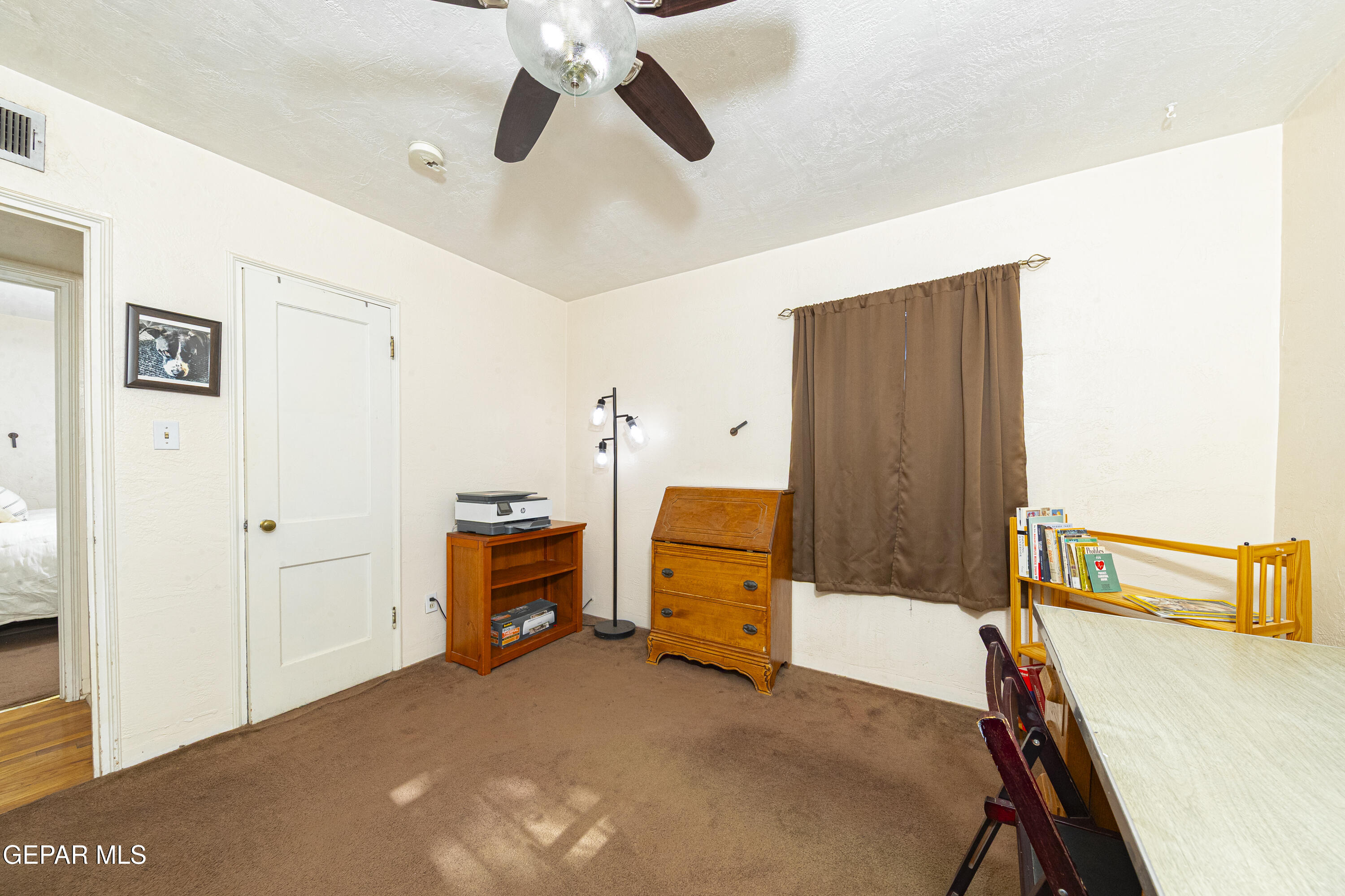 3329 Harrison Avenue El Paso, TX 79930 - Photo 23 of 38 a bedroom with furniture and a window