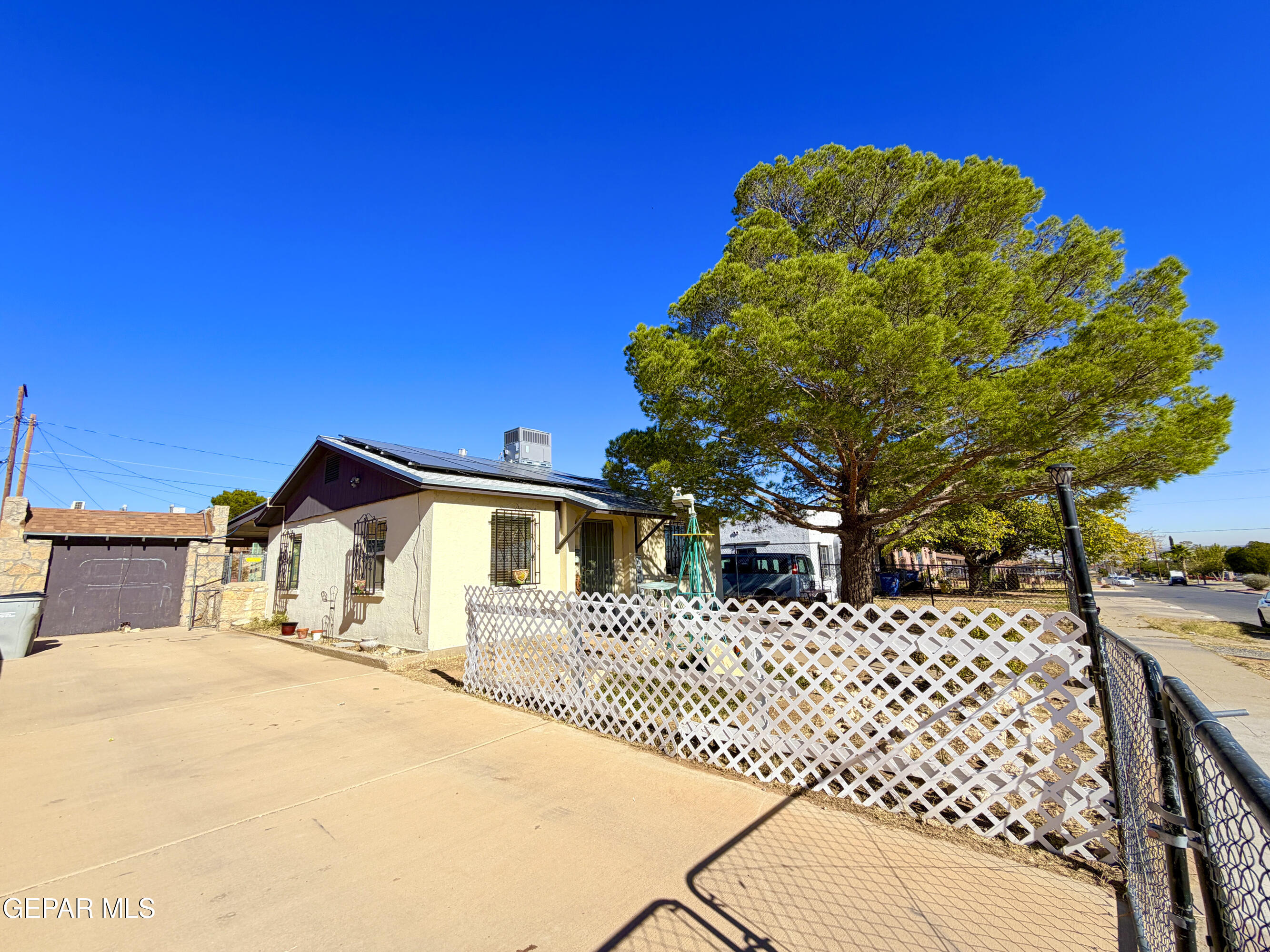 3329 Harrison Avenue El Paso, TX 79930 - Photo 5 of 38 a view of a house with a yard