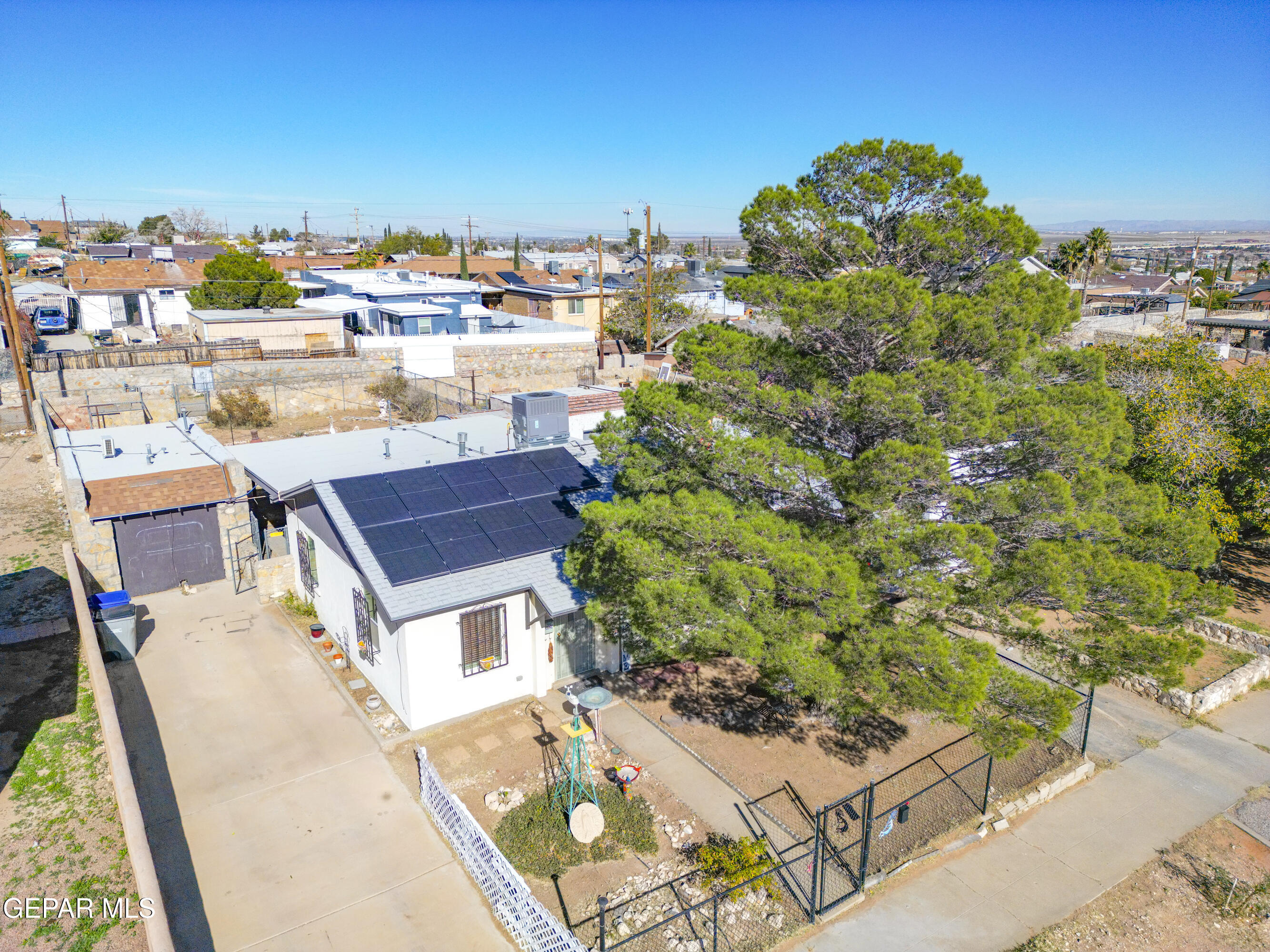 3329 Harrison Avenue El Paso, TX 79930 - Photo 6 of 38 an aerial view of a house with a yard