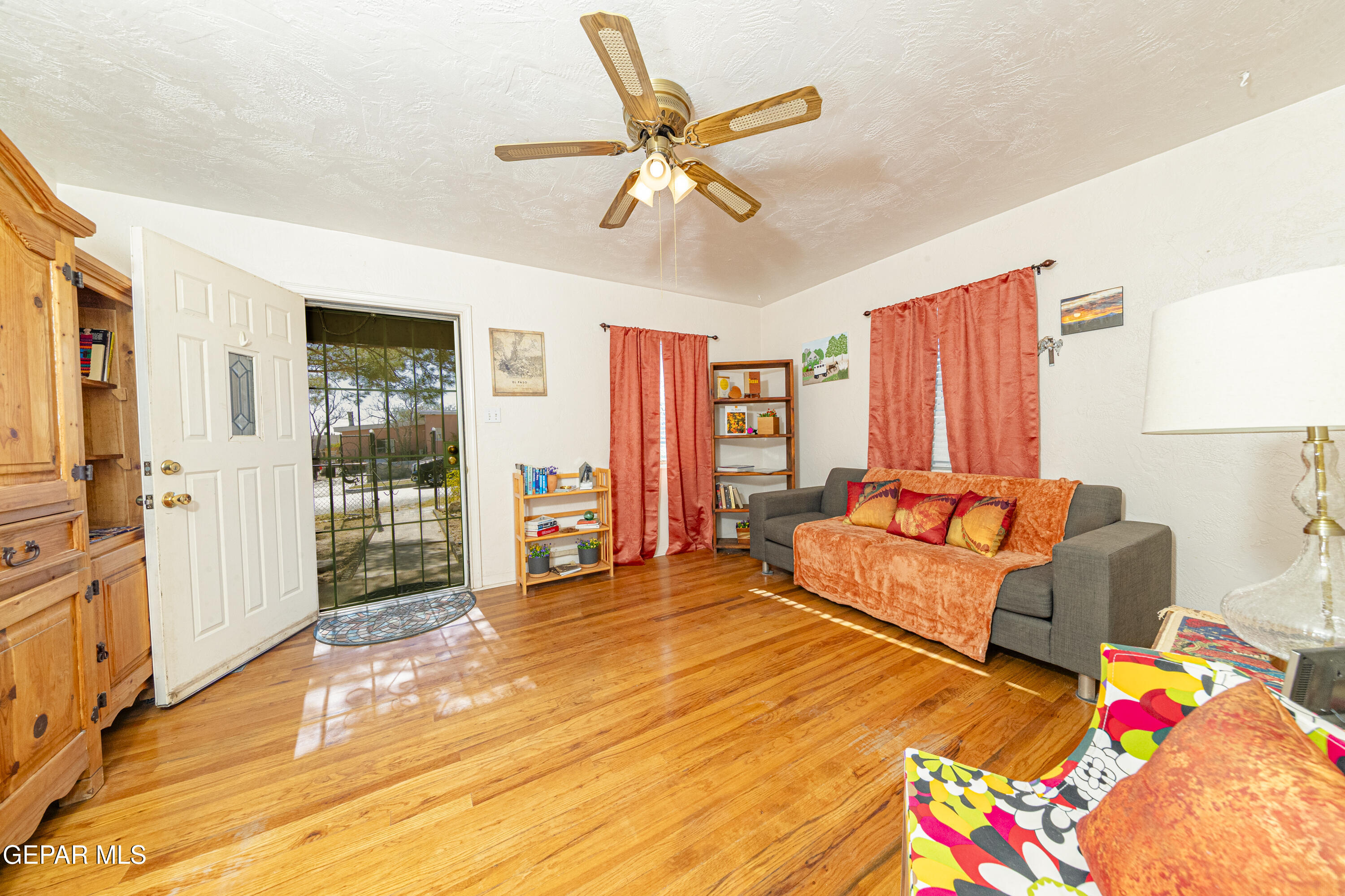 3329 Harrison Avenue El Paso, TX 79930 - Photo 10 of 38 a bedroom with a bed and ceiling fan