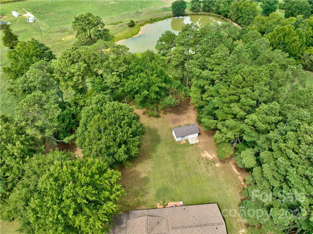 6118 South Rocky River Road Monroe, NC 28112 - Photo 29 of 33 a view of a yard