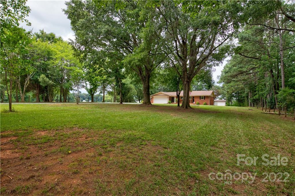 6118 South Rocky River Road Monroe, NC 28112 - Photo 32 of 33 a view of a park with large trees