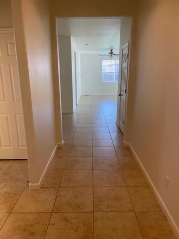 a room with a mirror and a vanity