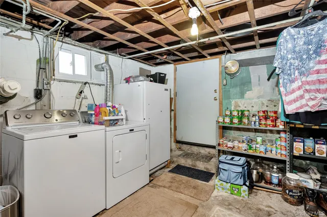 a storage room with washer and dryer