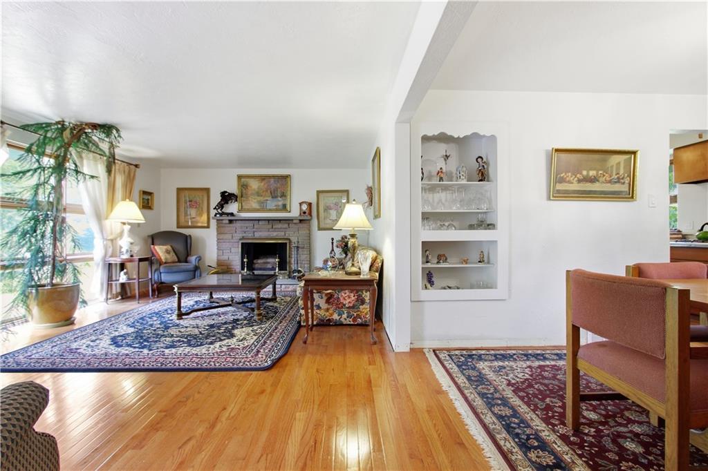 116 Hidden Valley Road Canonsburg, PA 15317 - Photo 6 of 33 Beautiful hardwood floors and abundant natural light create a warm, inviting atmosphere for friends and family.