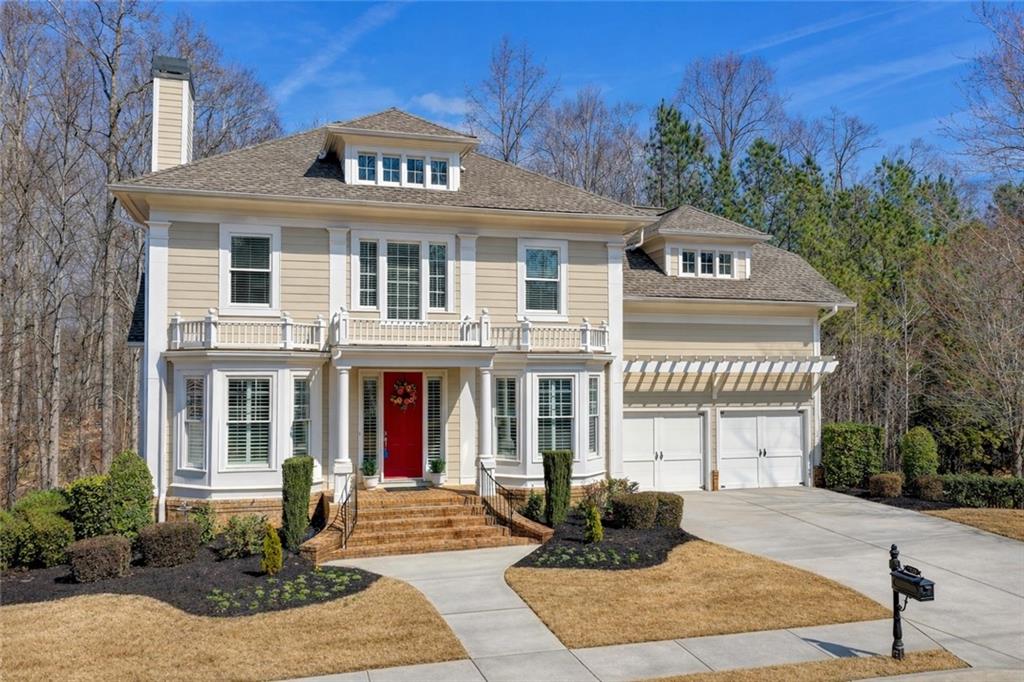 a front view of a house with yard