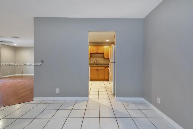 22765 Southwest 66th Avenue, Unit 205 Boca Raton, FL 33428 - Photo 13 of 24 a view of an empty room and window