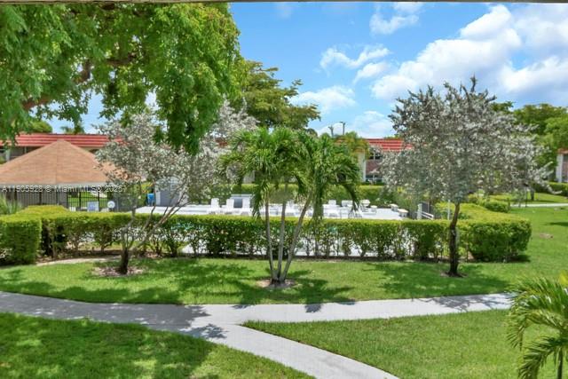 22765 Southwest 66th Avenue, Unit 205 Boca Raton, FL 33428 - Photo 10 of 24 a view of a park with large trees