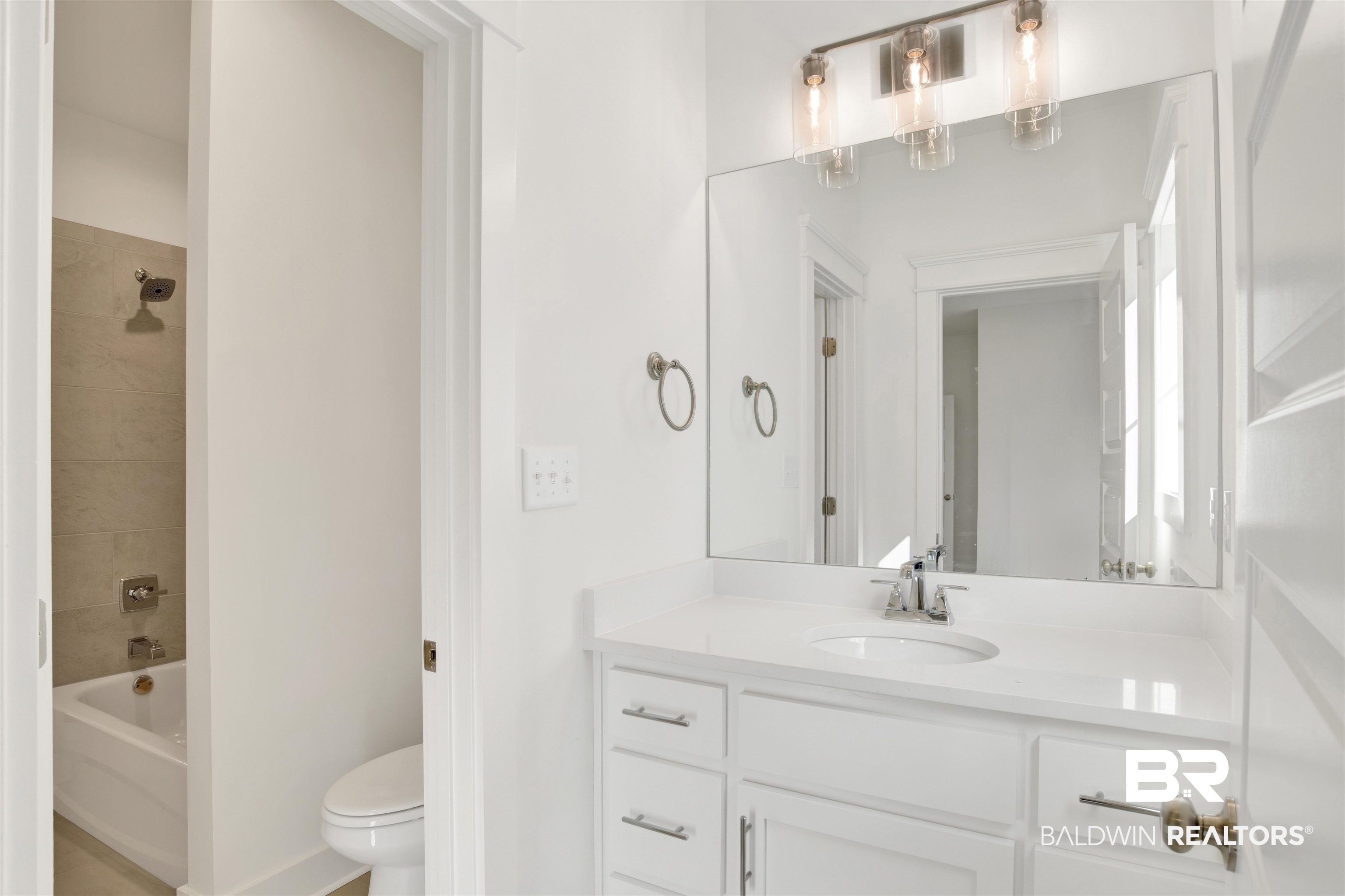 5 Long Leaf Circle Fairhope, AL 36532 - Photo 27 of 44 Full bathroom featuring vanity, tiled shower / bath combo, and toilet
