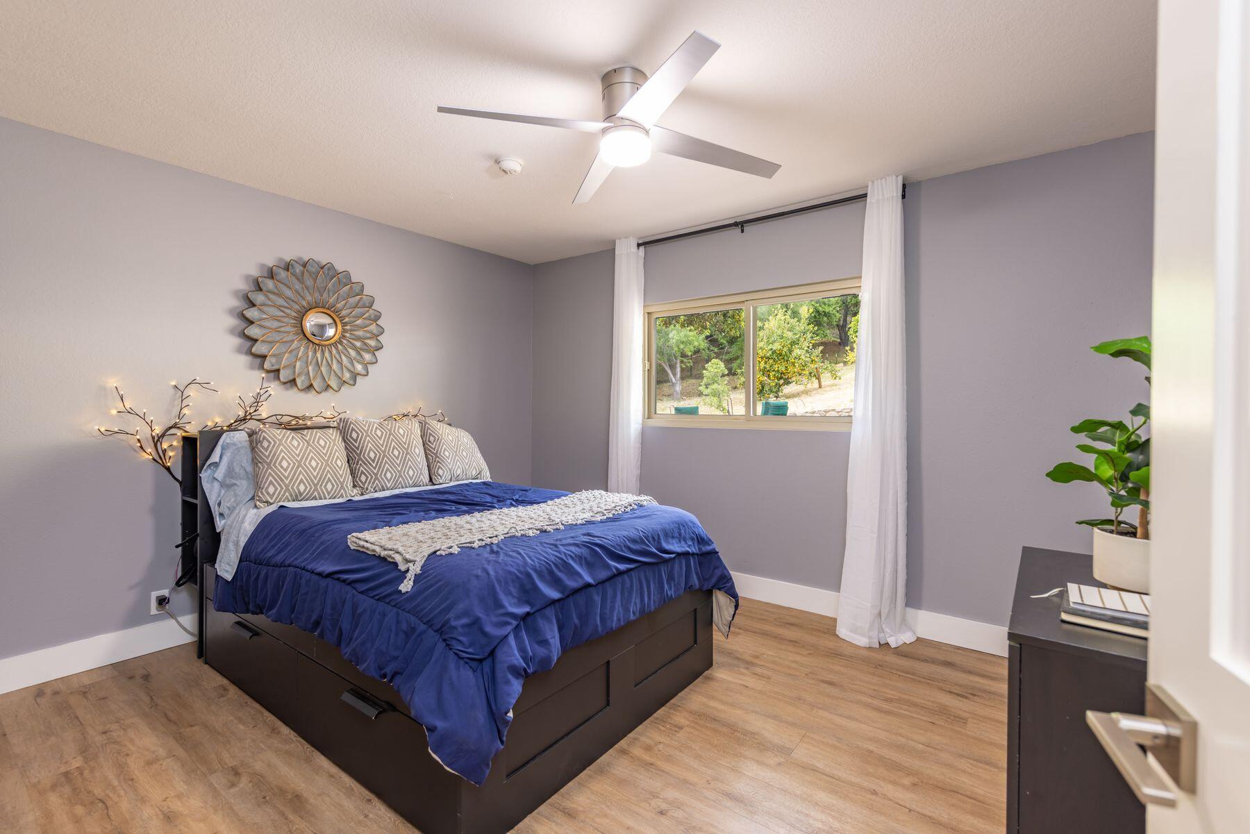 217 Sunset Street Oak View, CA 93022 - Photo 18 of 28 a bedroom with a bed and a window