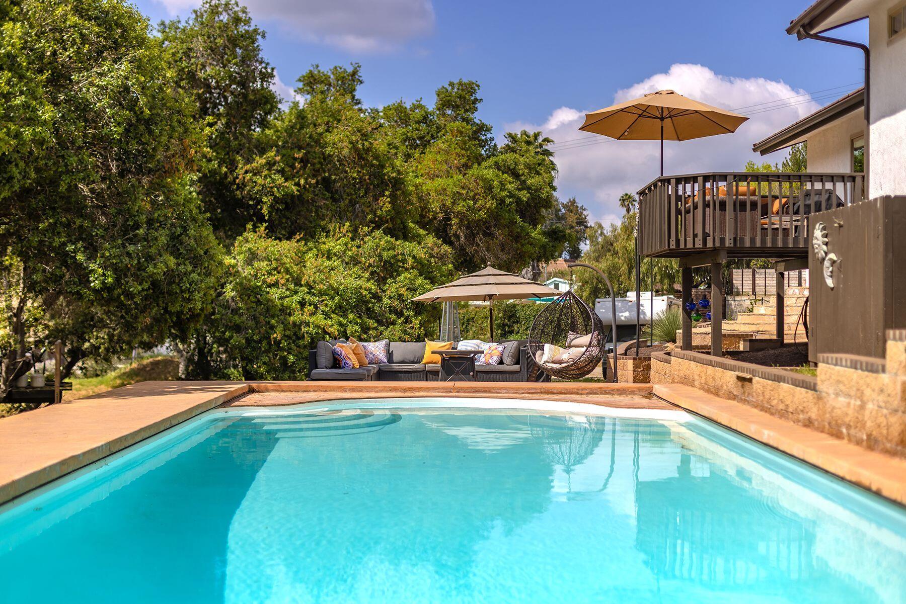217 Sunset Street Oak View, CA 93022 - Photo 3 of 28 a view of a swimming pool with an outdoor seating