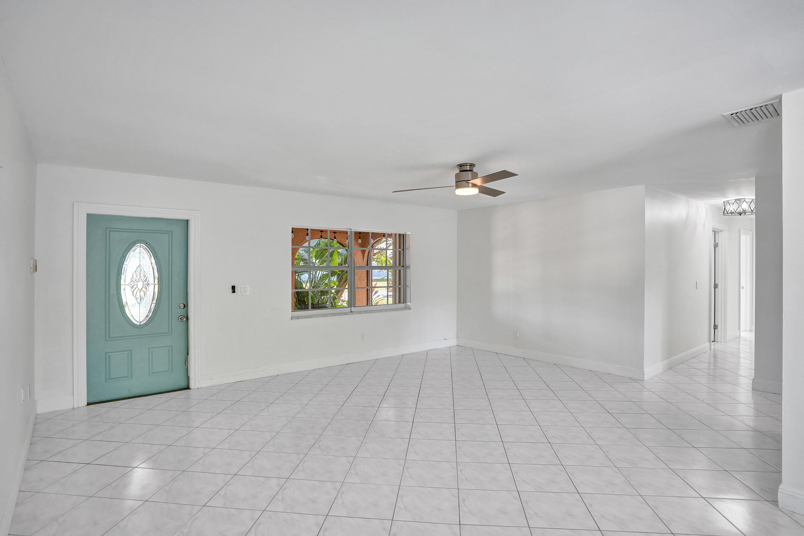 22335 Boulder Street Boca Raton, FL 33428 - Photo 11 of 36 a view of a hallway with closet