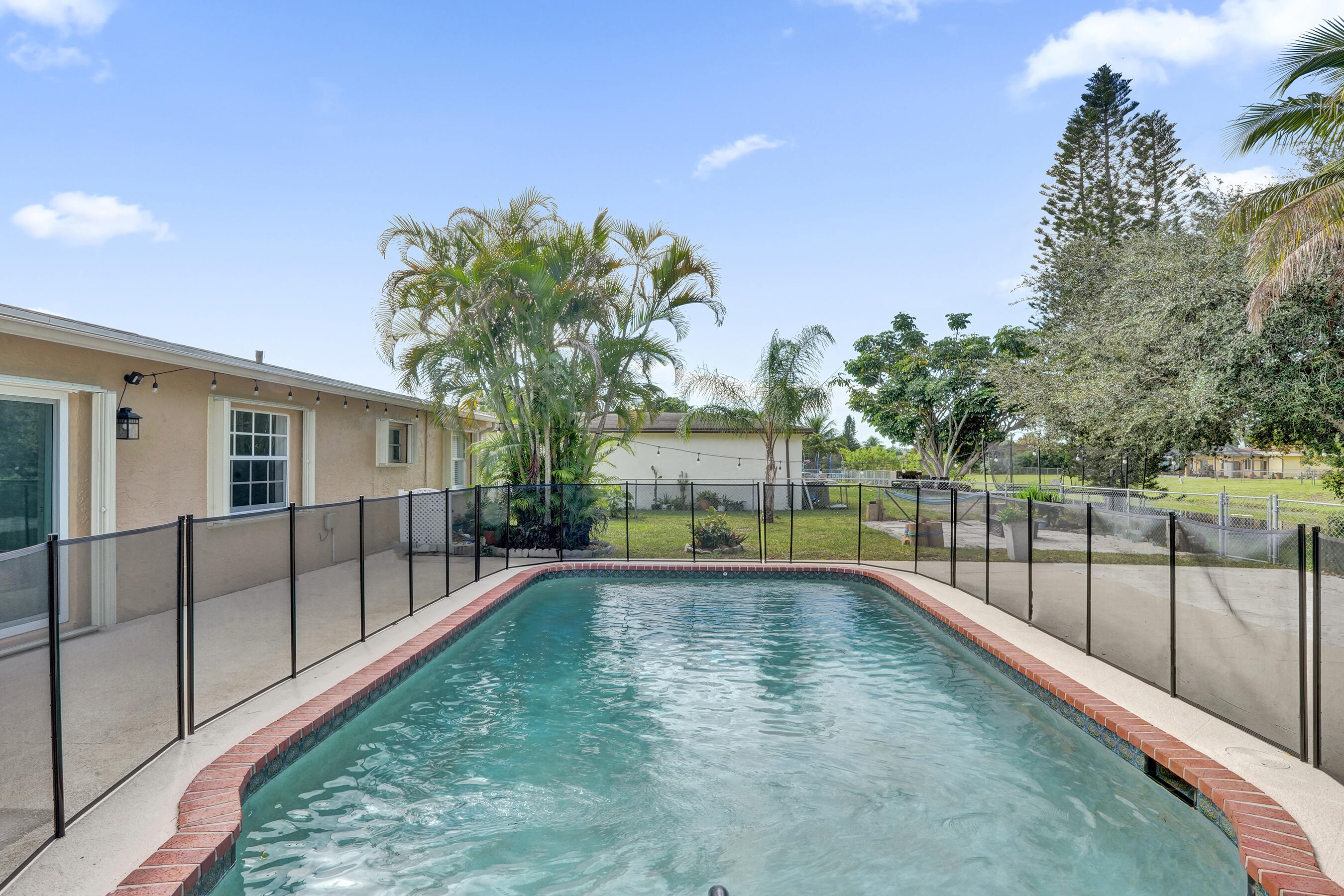 22335 Boulder Street Boca Raton, FL 33428 - Photo 24 of 36 a view of a backyard