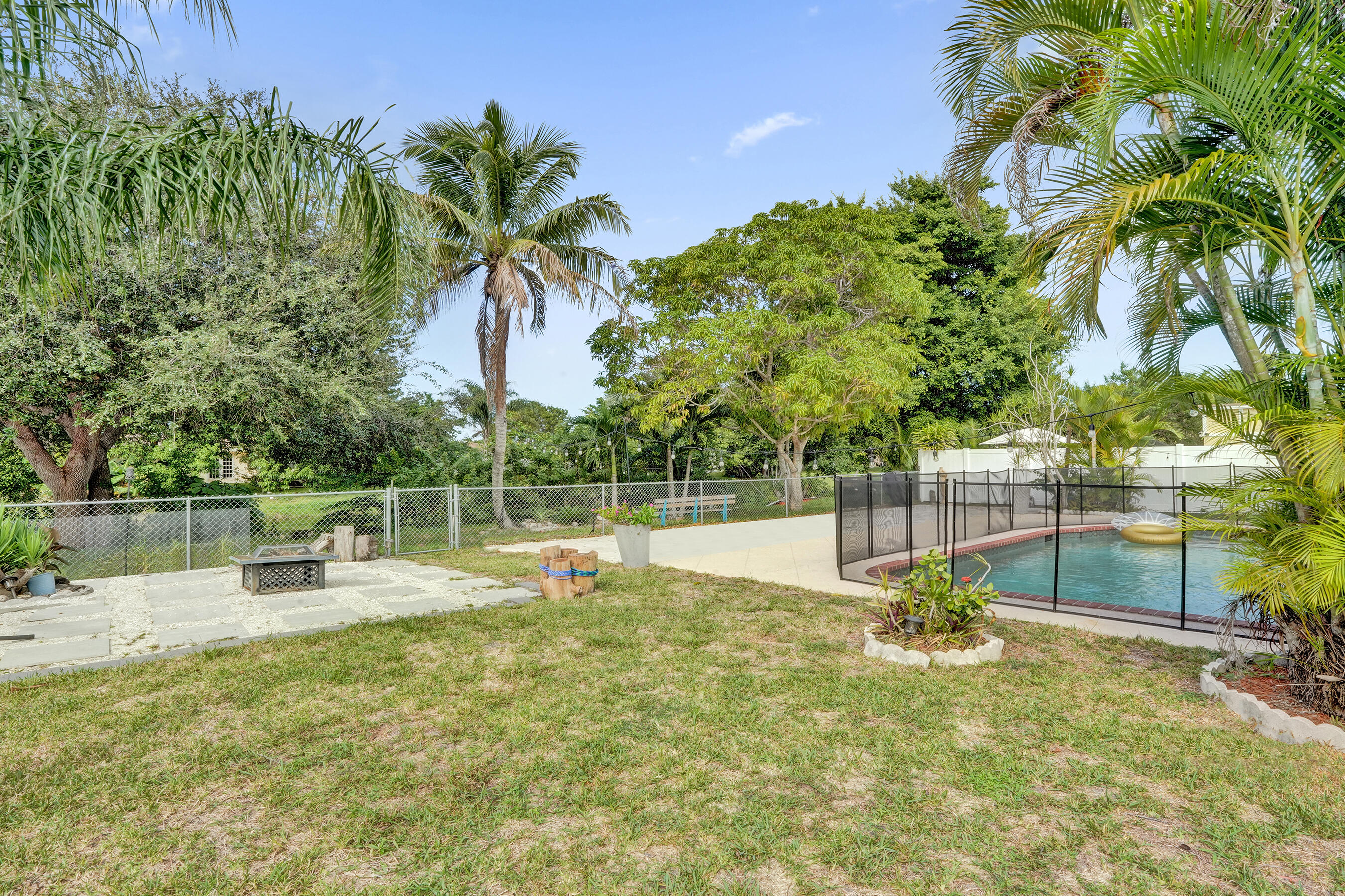 22335 Boulder Street Boca Raton, FL 33428 - Photo 33 of 36 a view of a park with swings and slides