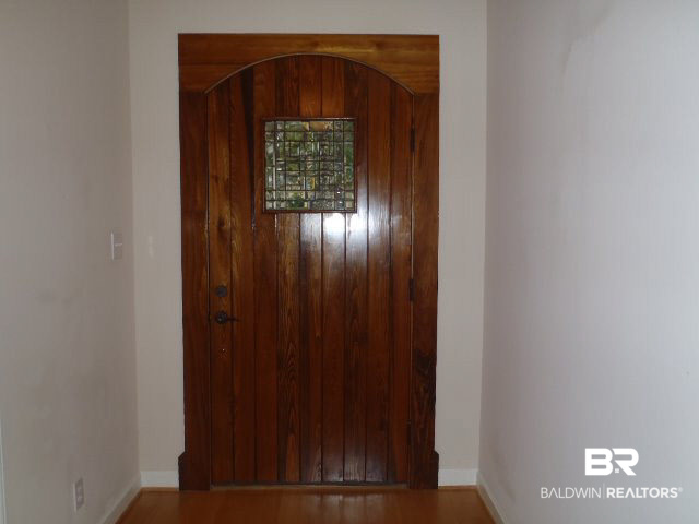 107 Chestnut Ridge Fairhope, AL 36532 - Photo 10 of 20 Custom 4 foot wide front door with handmade beveled glass art.