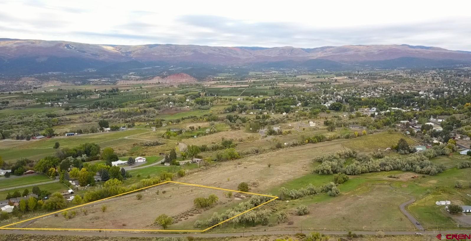 1266 Southwest 11th Avenue Cedaredge, CO 81413 - Photo 9 of 10 a view of a city with a mountain