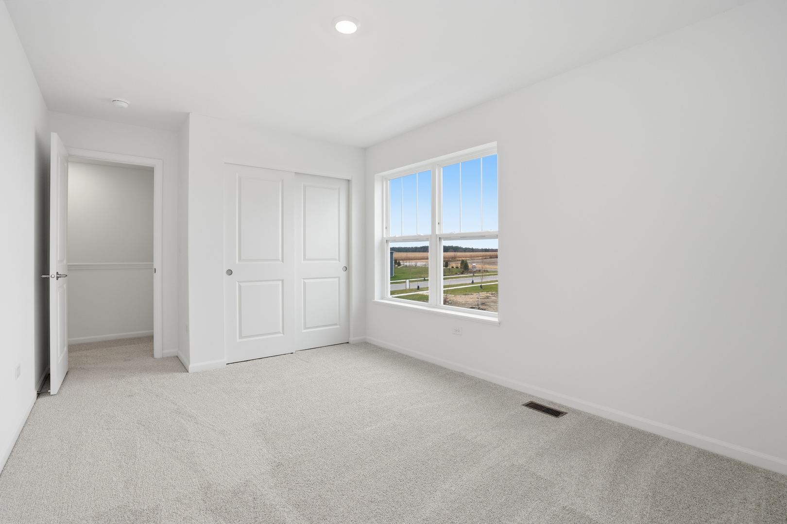342 Danforth Drive Oswego, IL 60543 - Photo 16 of 21 an empty room with windows