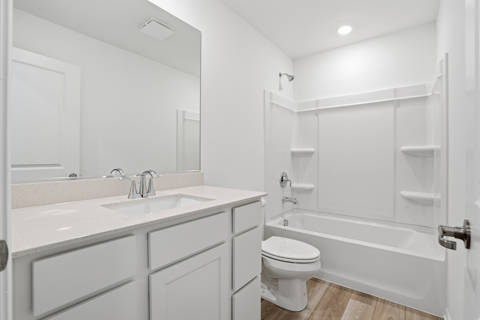 342 Danforth Drive Oswego, IL 60543 - Photo 17 of 21 a bathroom with a sink a toilet and a bathtub