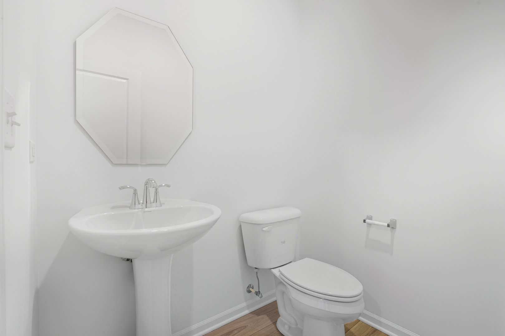 342 Danforth Drive Oswego, IL 60543 - Photo 18 of 21 a bathroom with a toilet sink and mirror