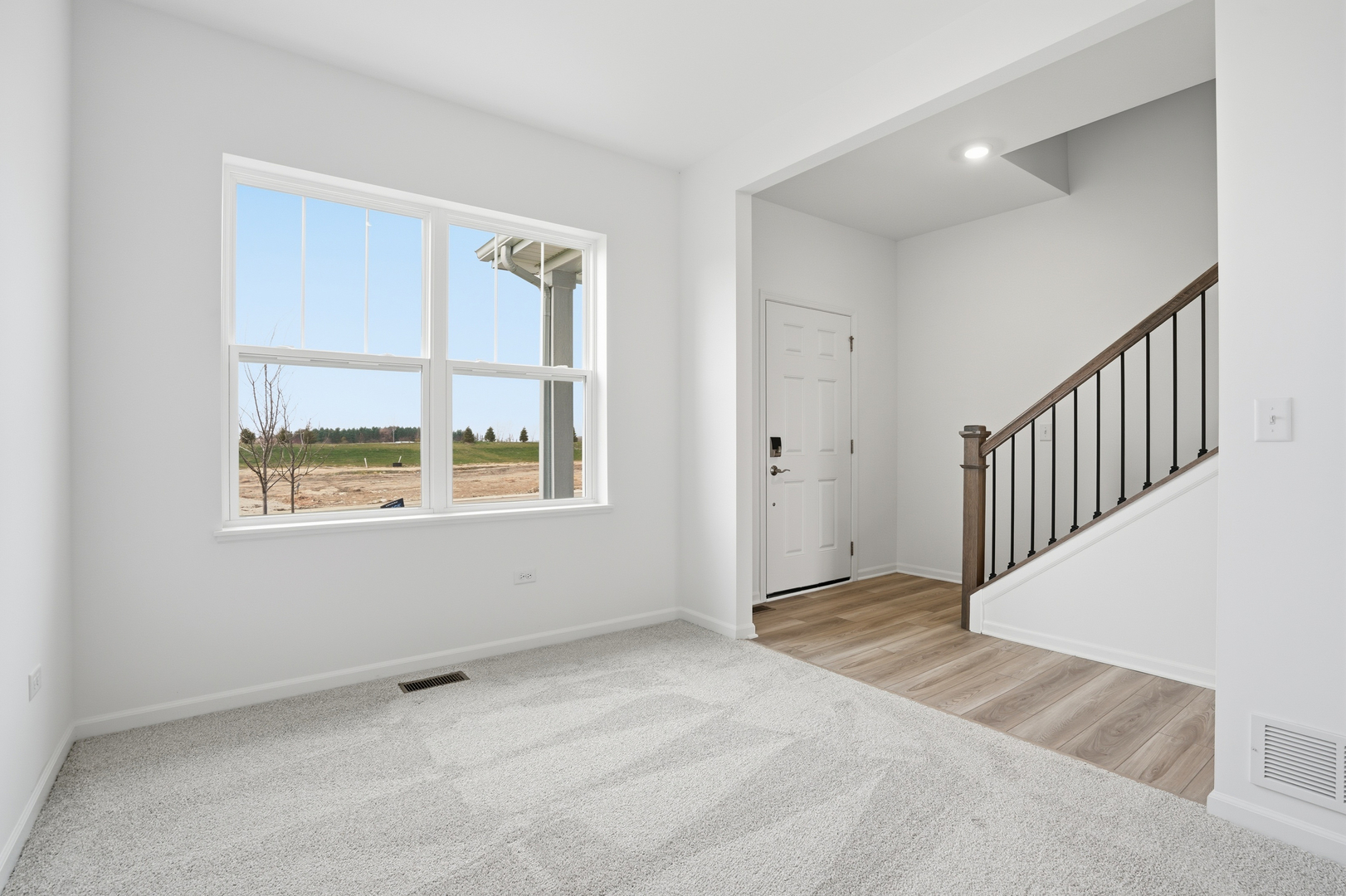 342 Danforth Drive Oswego, IL 60543 - Photo 3 of 21 a view of an empty room with a window