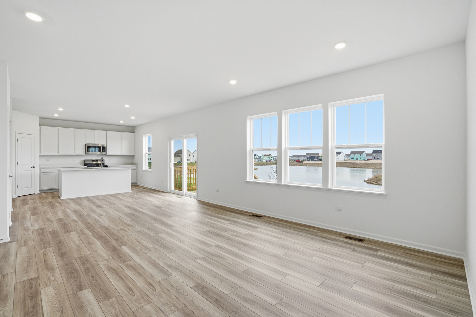 342 Danforth Drive Oswego, IL 60543 - Photo 5 of 21 a view of an empty room with a window