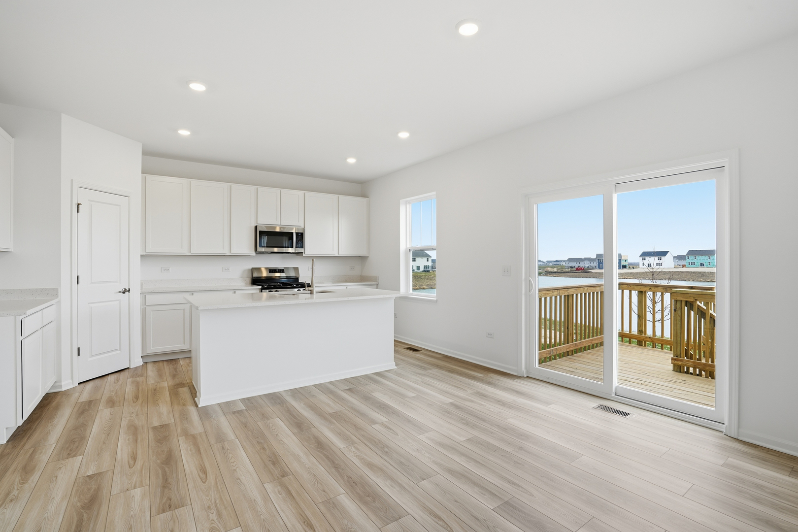 342 Danforth Drive Oswego, IL 60543 - Photo 7 of 21 a view of kitchen with wooden floor
