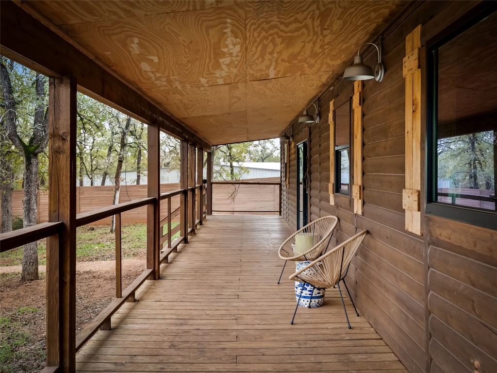 127 Marina Road Smithville, TX 78957 - Photo 20 of 40 a view of a porch with furniture and wooden floor