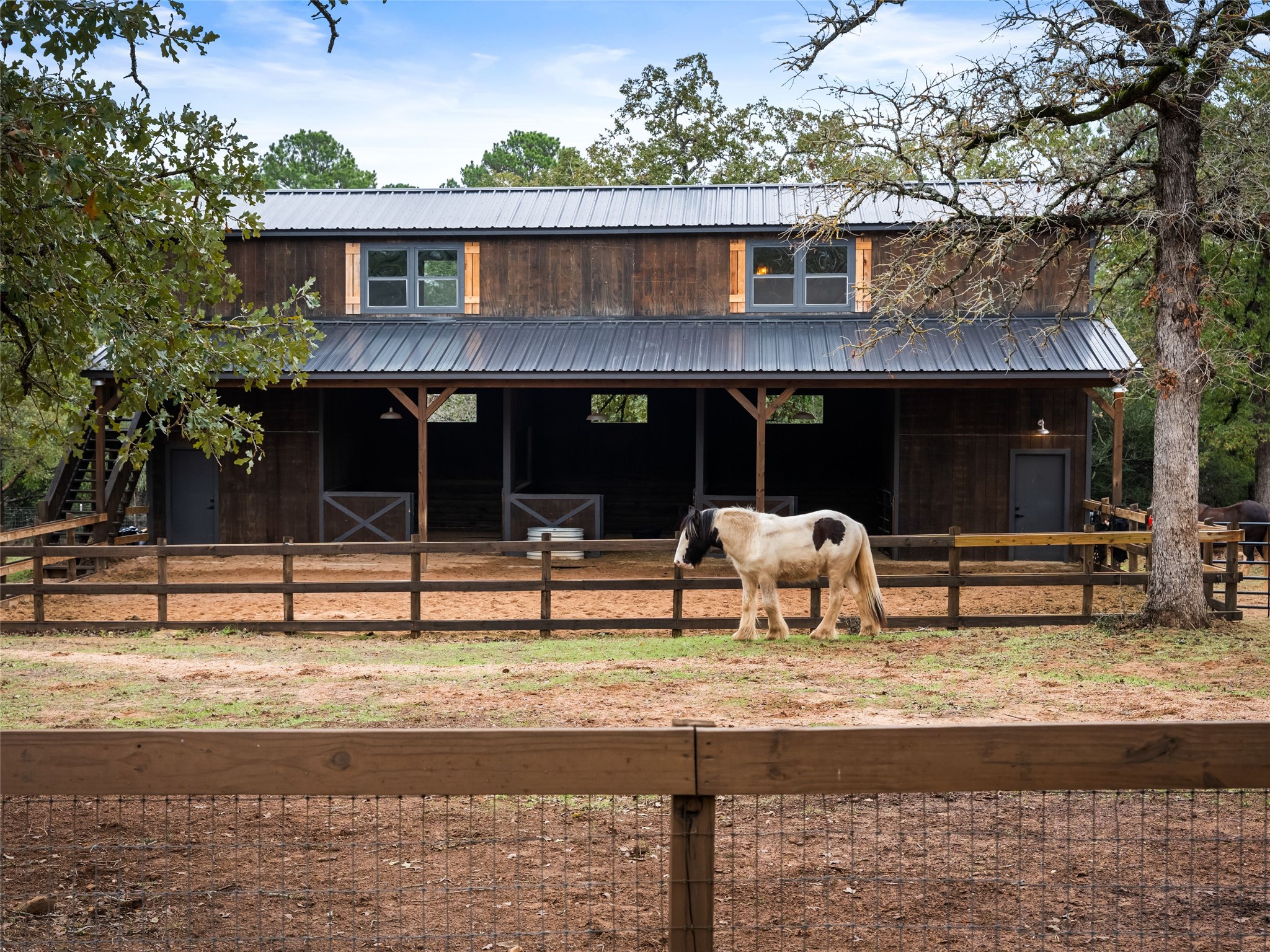 127 Marina Road Smithville, TX 78957 - Photo 22 of 40 a view of a house with a yard and sitting area