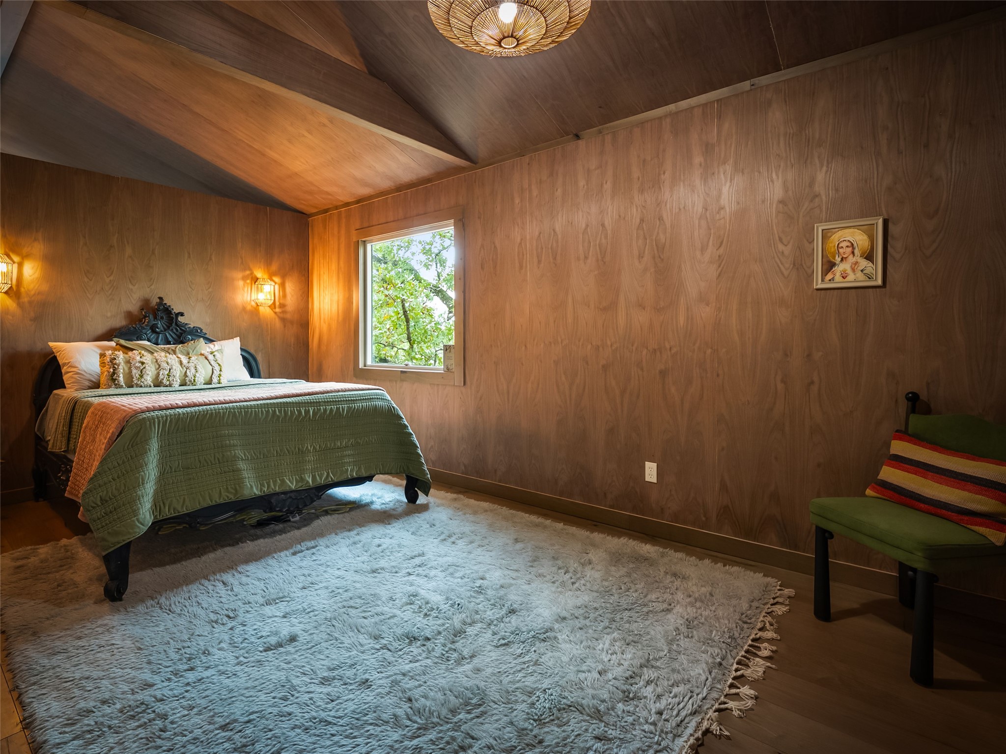127 Marina Road Smithville, TX 78957 - Photo 27 of 40 a bedroom with a bed and a lamp on table