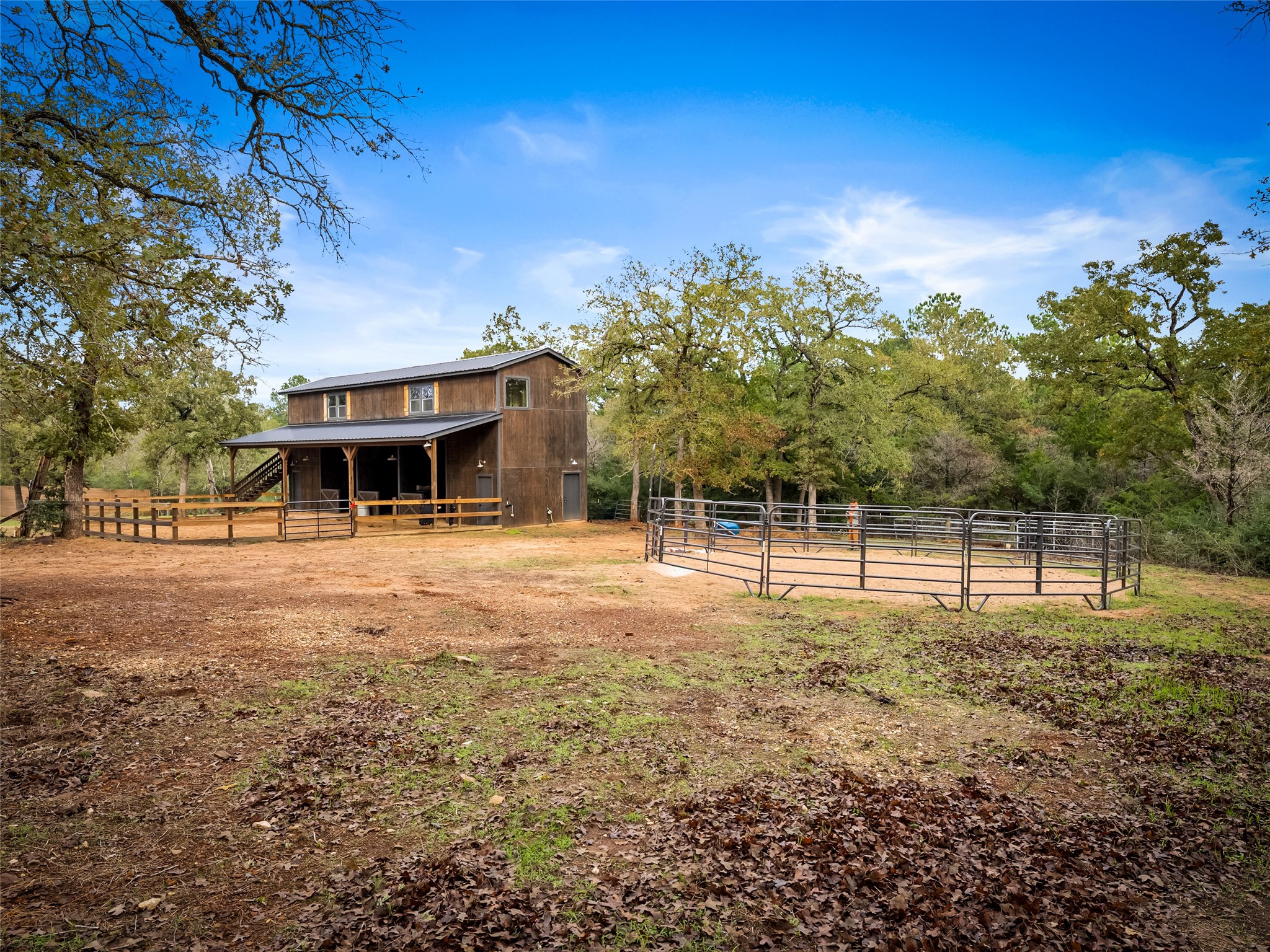 127 Marina Road Smithville, TX 78957 - Photo 31 of 40 a view of a house with a backyard