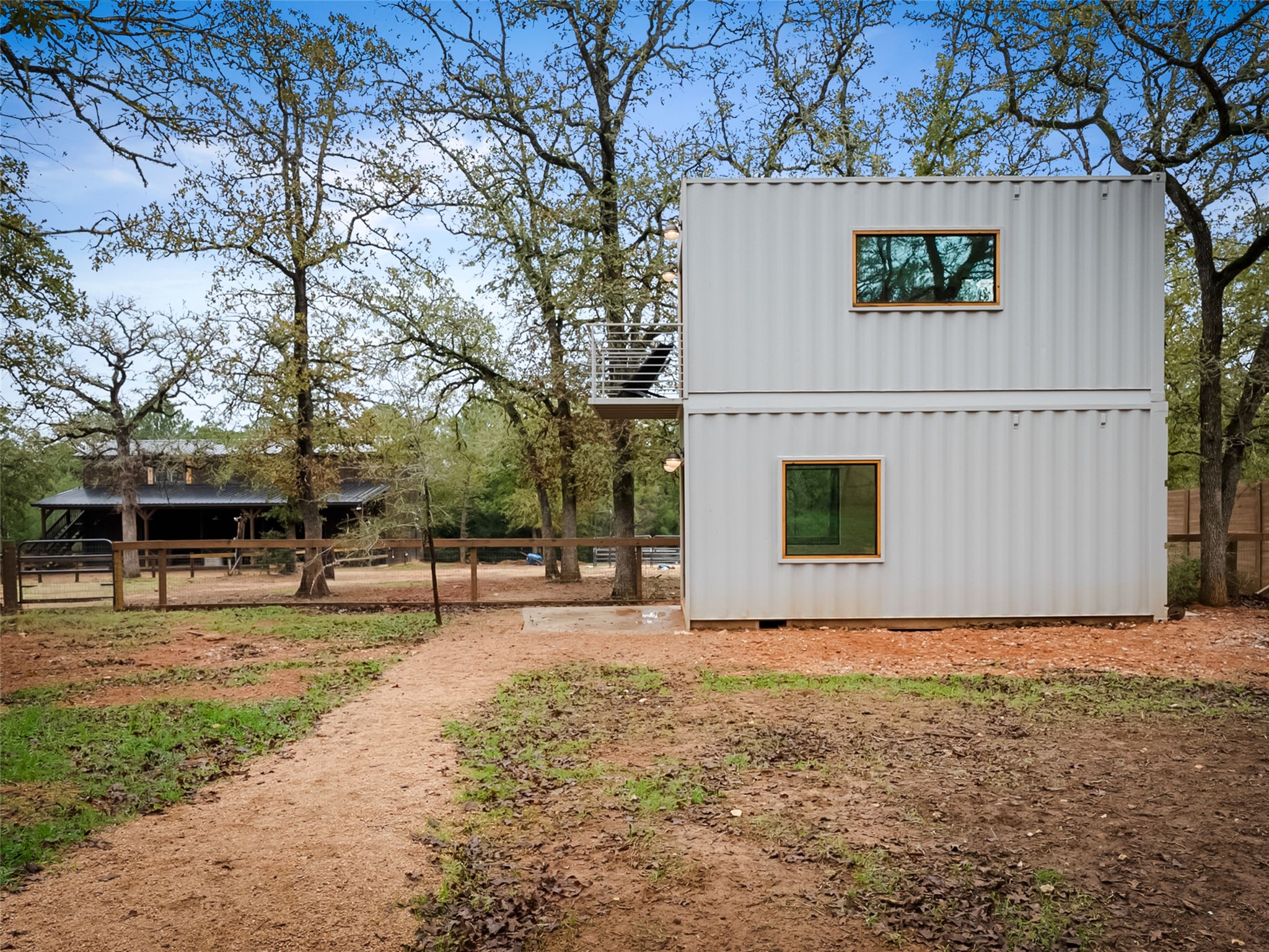 127 Marina Road Smithville, TX 78957 - Photo 5 of 40 a view of a yard with a tree