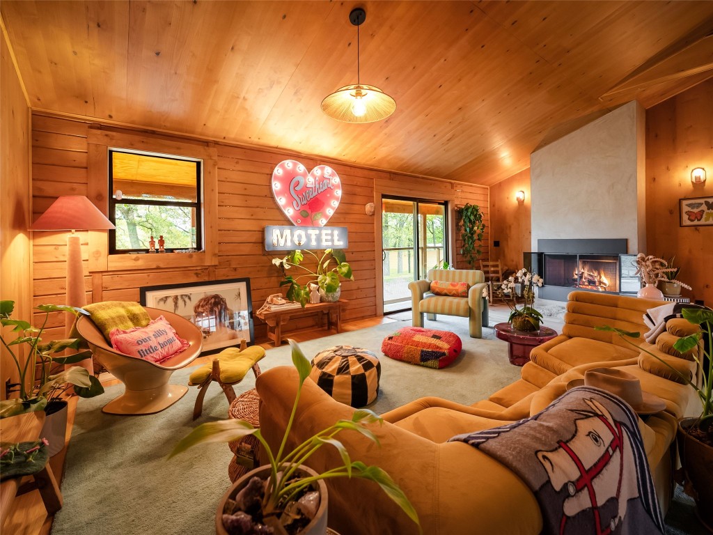 127 Marina Road Smithville, TX 78957 - Photo 8 of 40 a outdoor living space with furniture and a flat screen tv