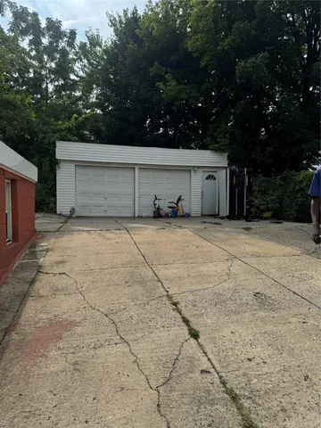 a view of a water fountain and a fire pit