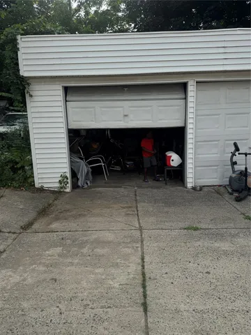 a view of a brick house with many windows