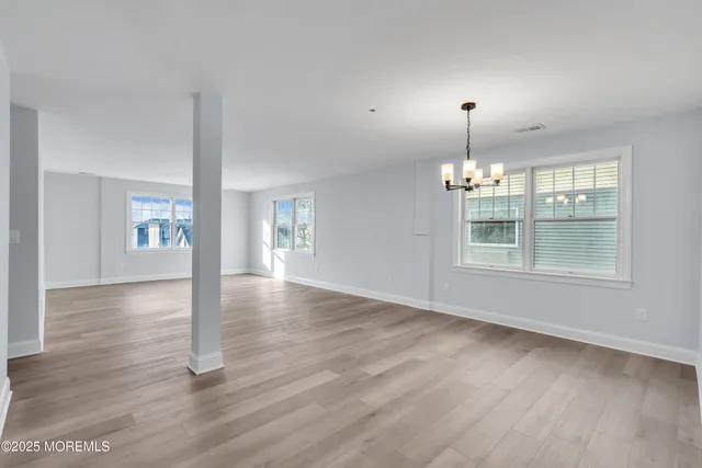 a view of livingroom with hardwood floor and window