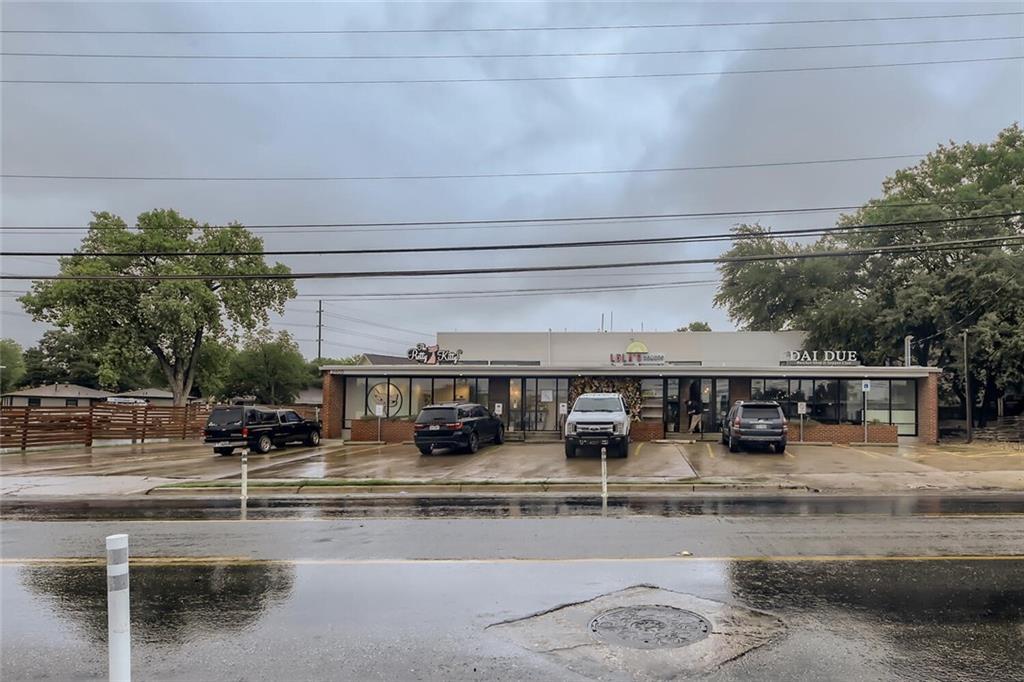 2401 Manor Road, Unit 111 Austin, TX 78722 - Photo 22 of 23 a view of a swimming pool with outdoor seating