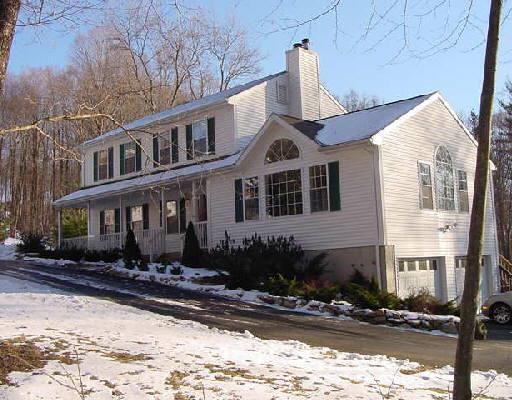 64 Pine Tree Hill Road Shelton, CT 06484 - Photo 1 of 1 a front view of a house with yard
