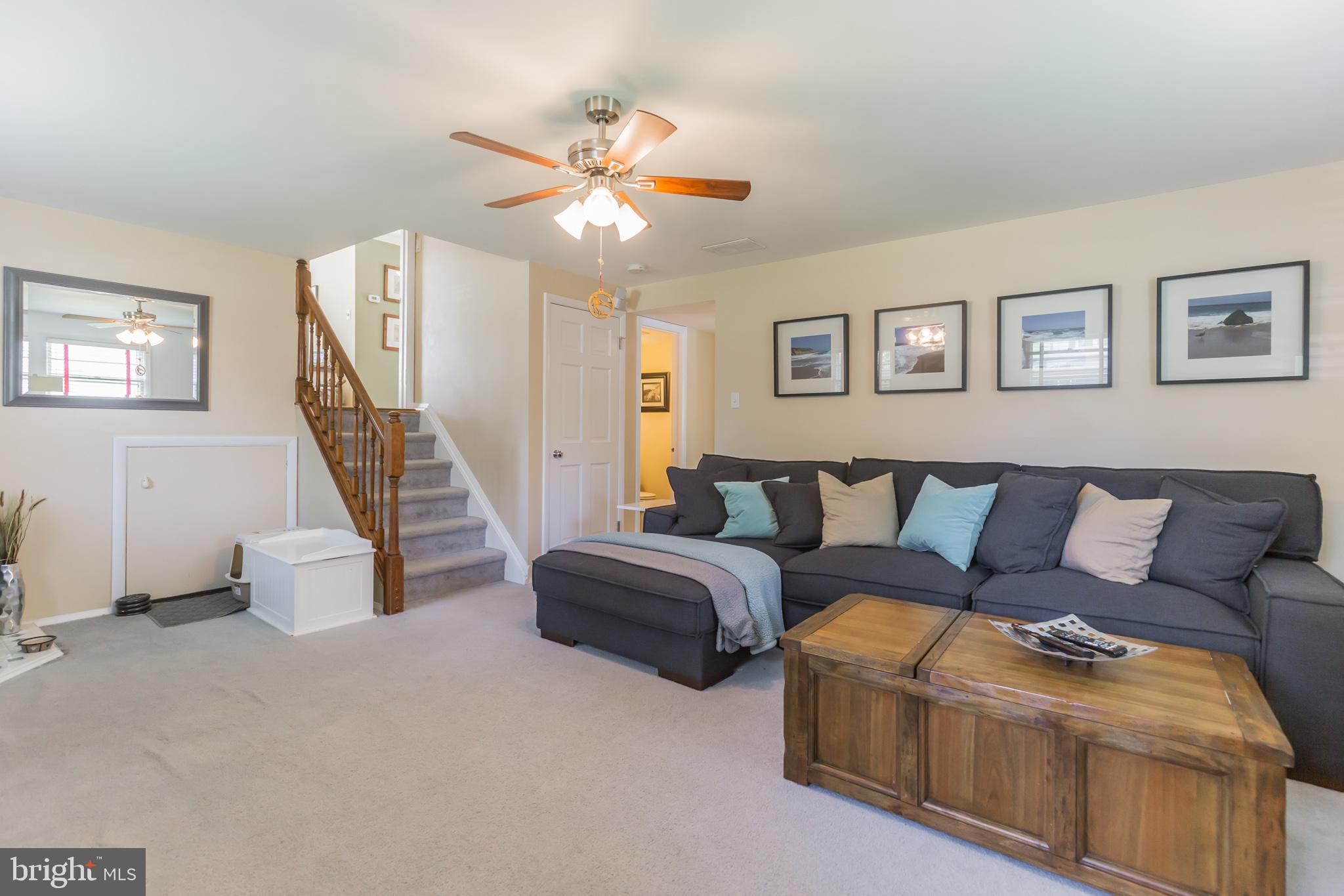 7020 Hadlow Drive Springfield, VA 22152 - Photo 15 of 29 a living room with furniture and stairs