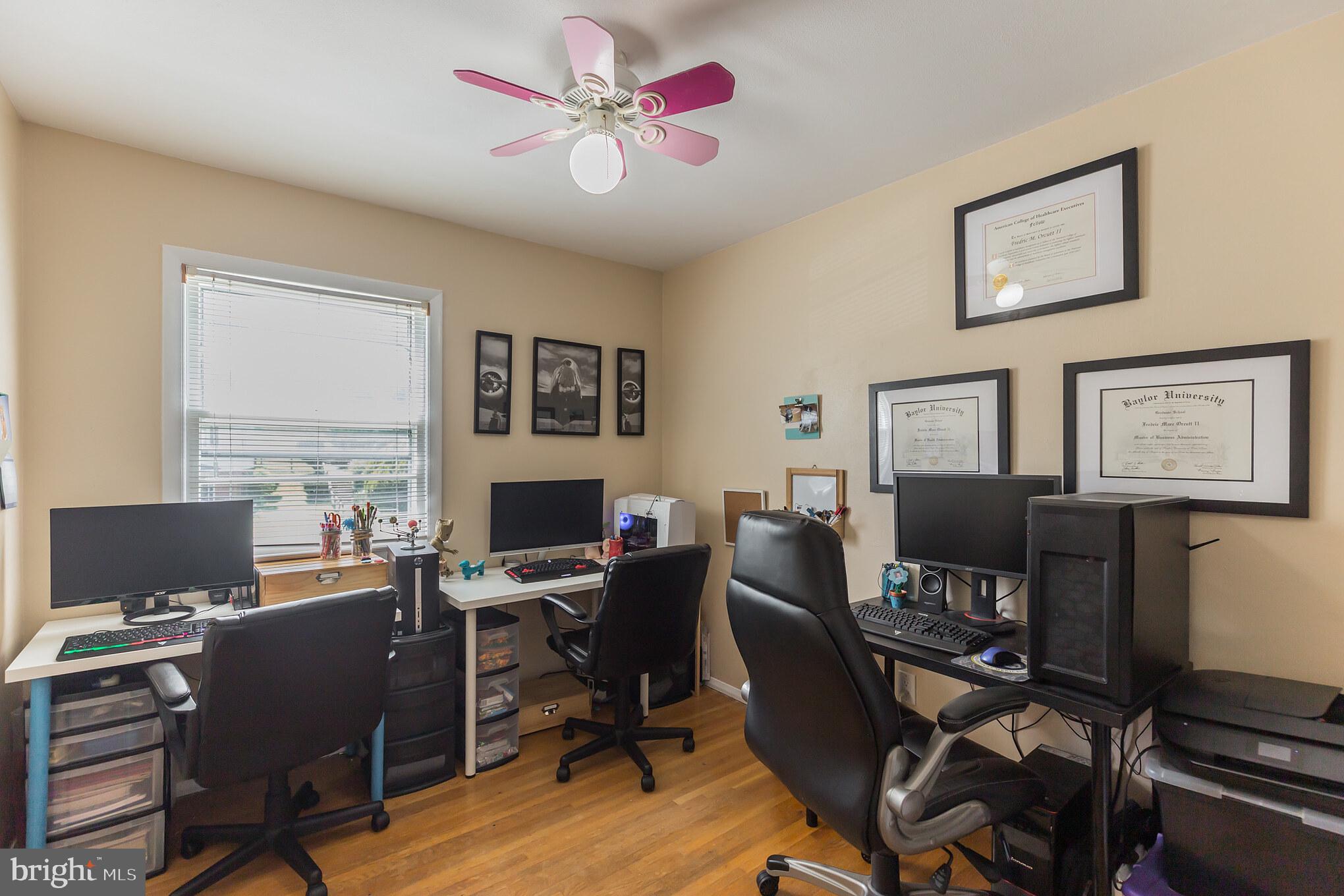 7020 Hadlow Drive Springfield, VA 22152 - Photo 17 of 29 a view of a workspace with furniture and a window