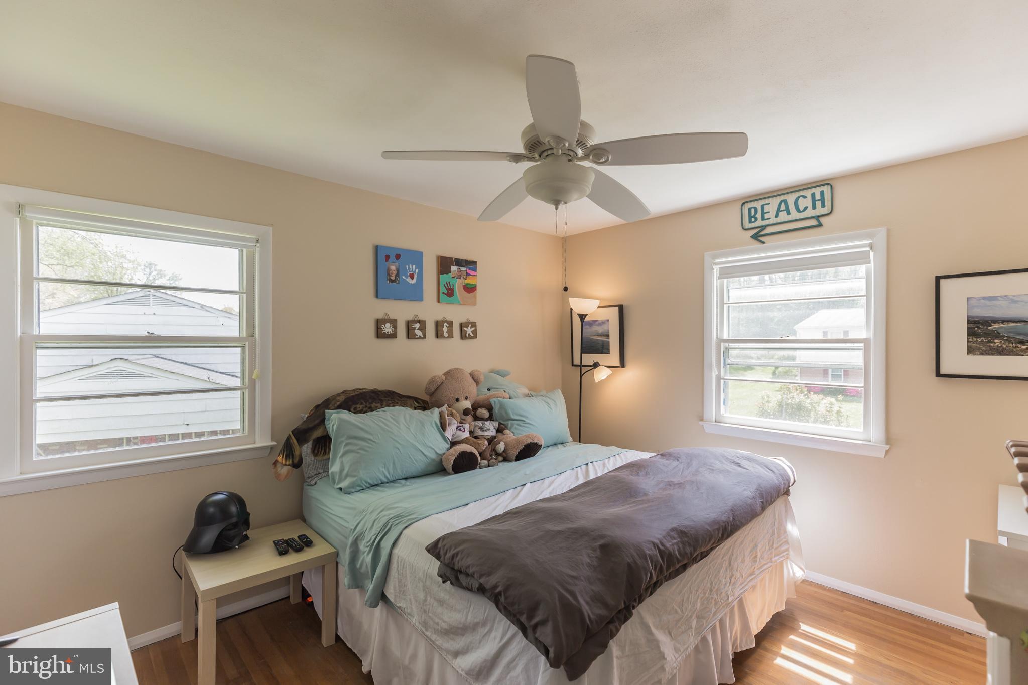 7020 Hadlow Drive Springfield, VA 22152 - Photo 18 of 29 a bedroom with a bed and a window